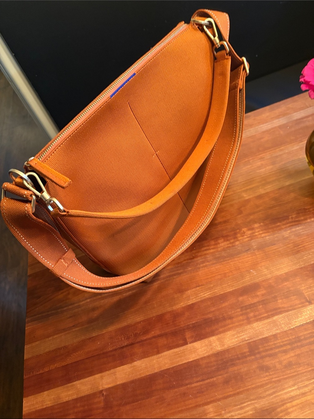 Rothy’s Mini Zip Bucket Bag, in burnt orange, like new - Picture 2 of 7